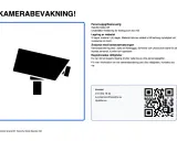 En skylt med texten "KAMERABEVAKNING!" och en ikon av en övervakningskamera. En verisure skylt som informerar om kamerabevakning.